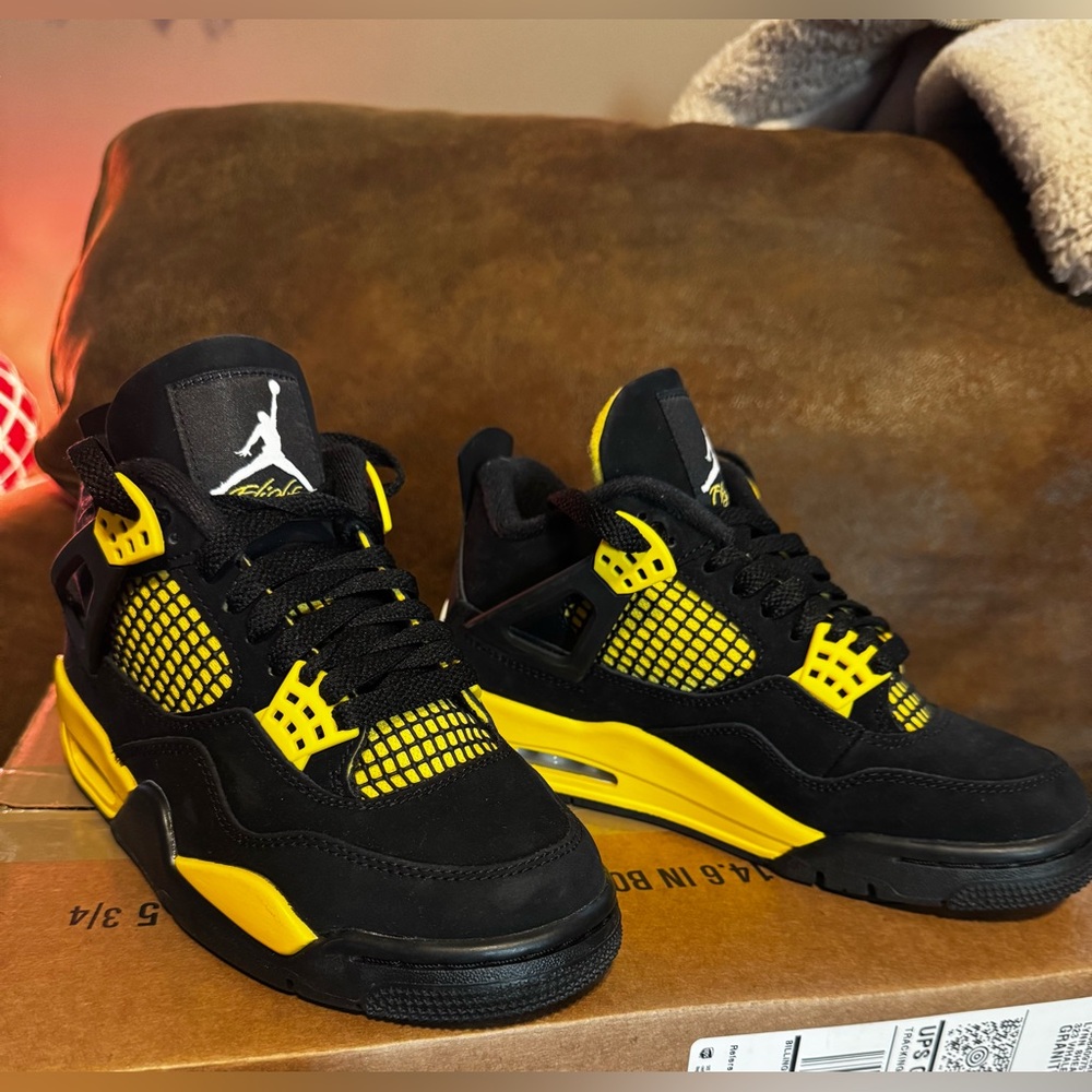 NEW!! Authentic Air Jordan 4 retro “thunder” size 3.5 yellow and black
